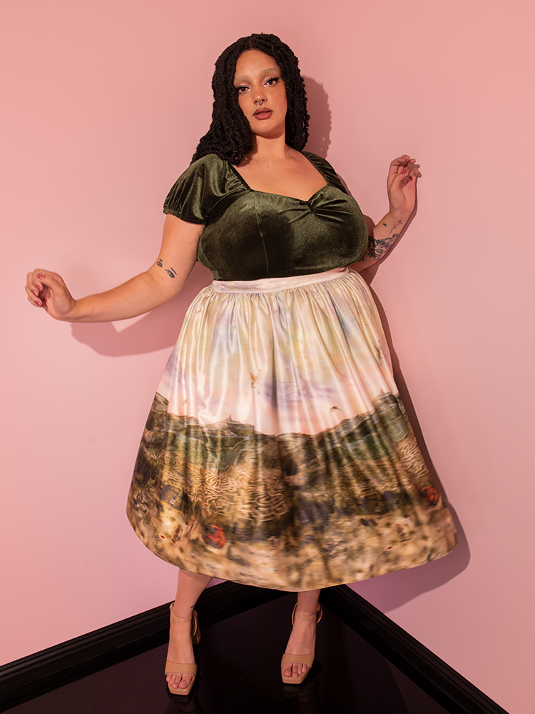 The LABYRINTH™ Renaissance Skirt in Labyrinth Watercolor Print by Vixen Clothing is beautifully showcased by this striking model, exuding timeless elegance.
