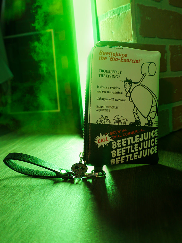 The front of the BEETLEJUICE™ Bio-Exorcist Wristlet Wallet with movie-accurate design on the front.