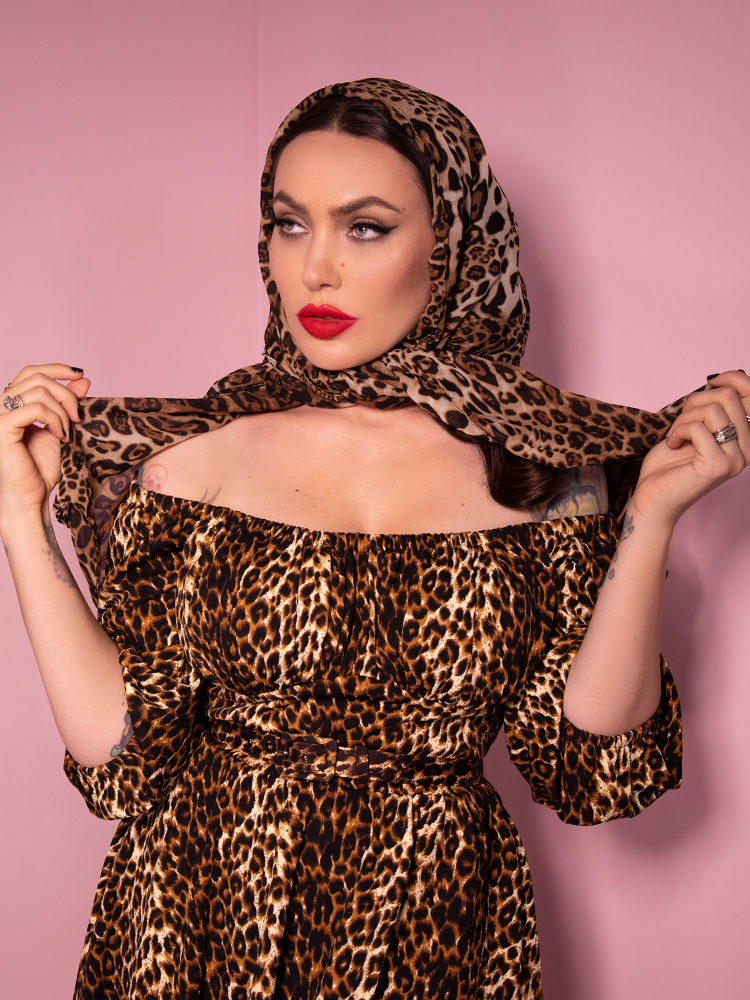 Vixen Clothing model and owner Micheline Pitt looking ravishing in an all leopard outfit including the all new Vintage Style Leopard Print Scarf.