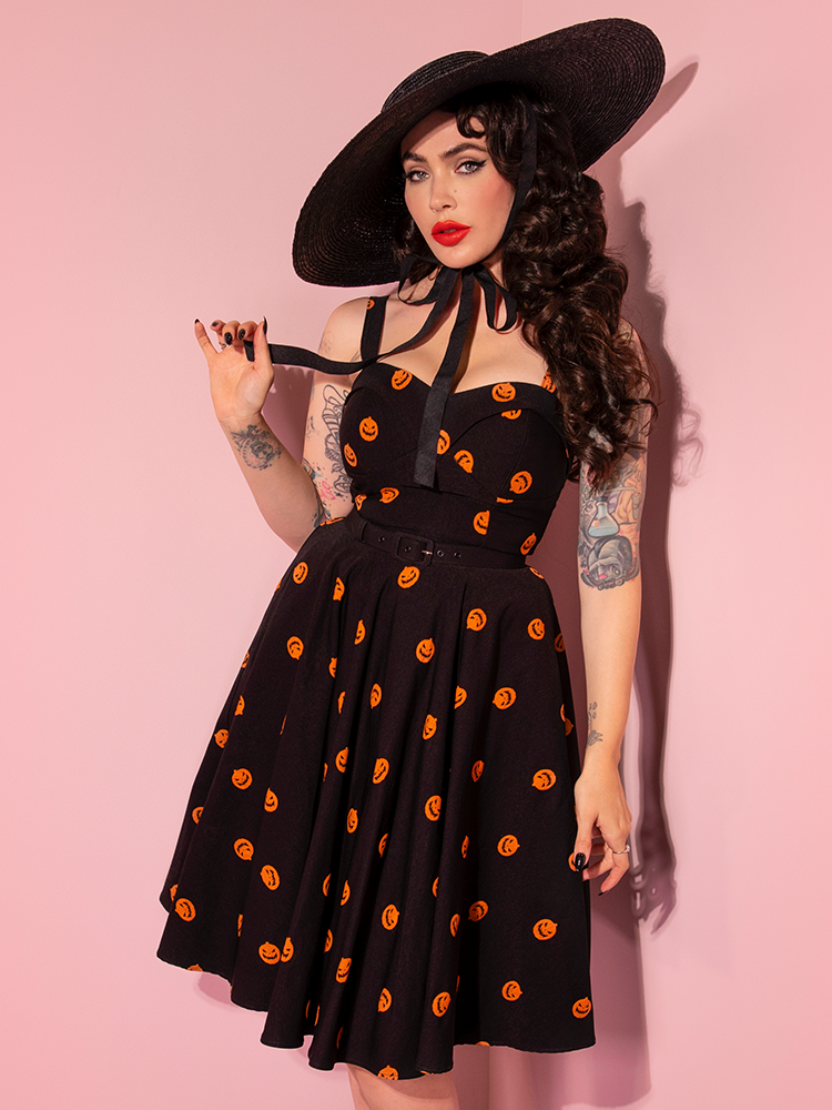 The Pumpkin King Maneater Swing Dress in Black from Vixen Clothing worn by owner and model Micheline Pitt. 