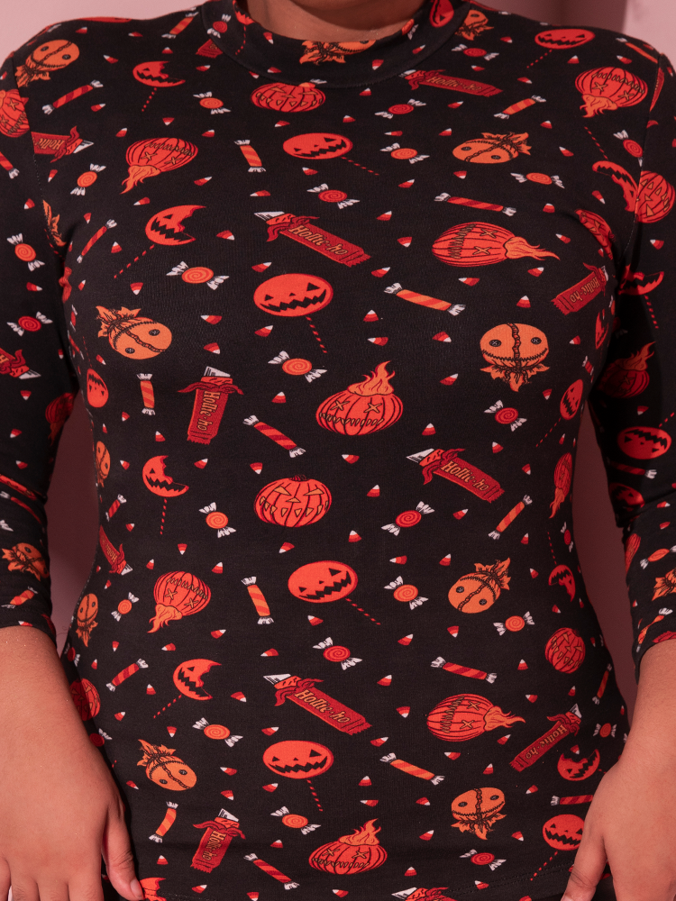 Close-up of the print on the TRICK R TREAT™ Bad Girl 3/4 Sleeve Top in Candy Corn Novelty Print.