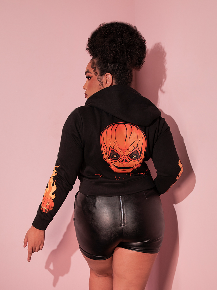 The back of the TRICK R TREAT™ Sam Cropped Hoodie featuring original character art by Micheline Pitt of the horror movie creature.
