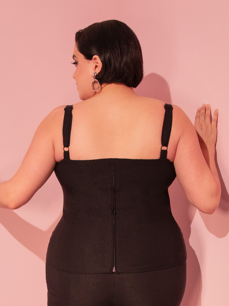 Channel your inner classic Hollywood starlet with the Jawbreaker Top in Black, a sleek choice that screams vintage glam.