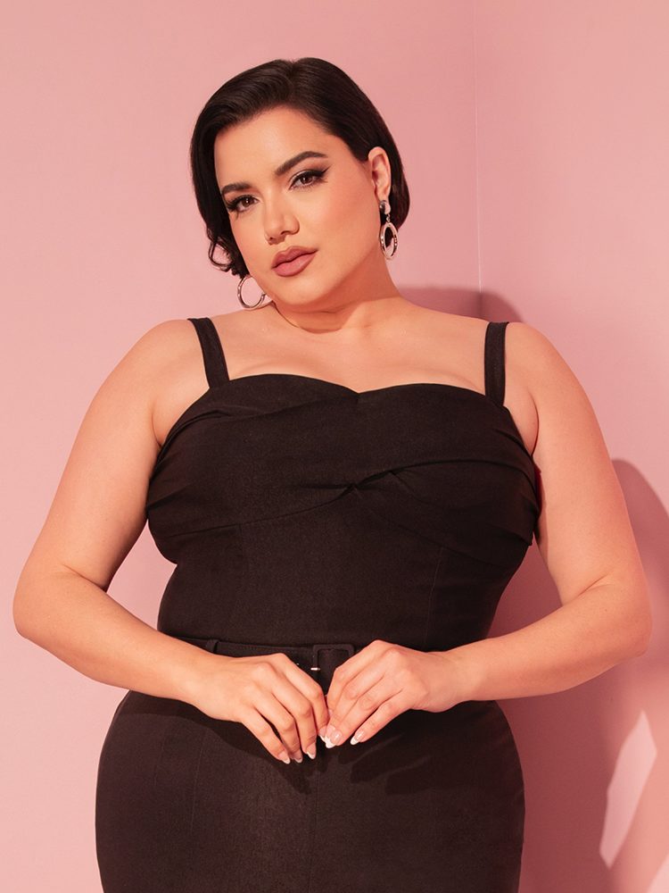 The Jawbreaker Top in Black is your go-to for achieving that effortlessly chic, classic Hollywood look—perfect with a retro pencil skirt.