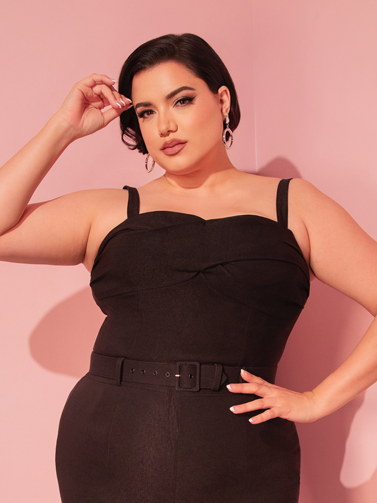 Capture the essence of classic Hollywood with the Jawbreaker Top in Black, a must-have for adding a retro twist to your everyday fashion.