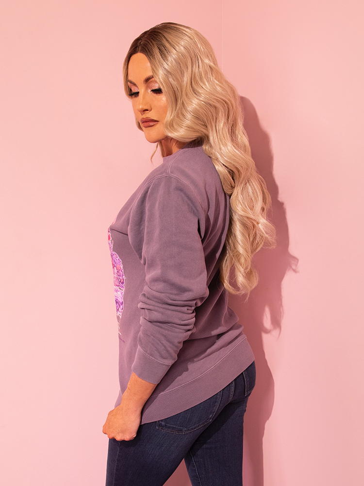 Explore the mystique of the Soft Lilac LABYRINTH™ Movie Poster Sweatshirt, expertly exhibited by our striking model and provided by Vixen Clothing's retro line.