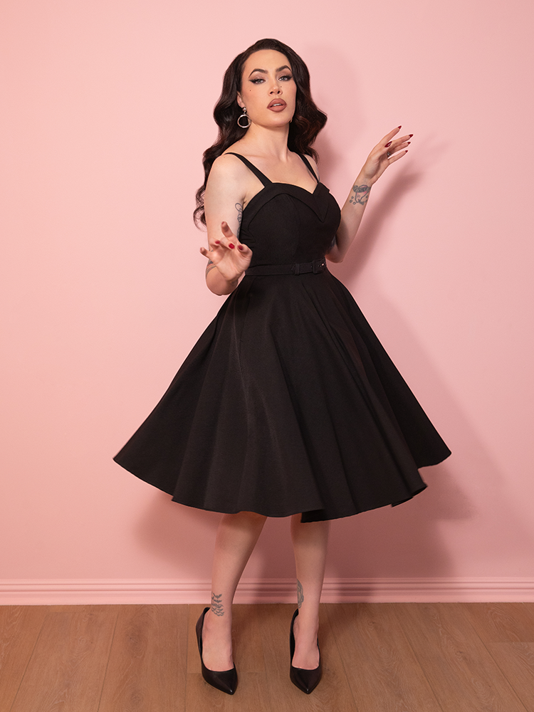 black midi swing dress Collectif Women's Black Long-Sleeve Swing Dress, UK 16