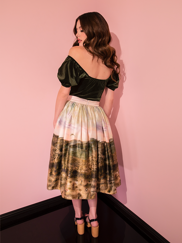 In the LABYRINTH™ Renaissance Skirt and the Labyrinth Watercolor Print, this beautiful model embodies the essence of Vixen Clothing's retro brand.