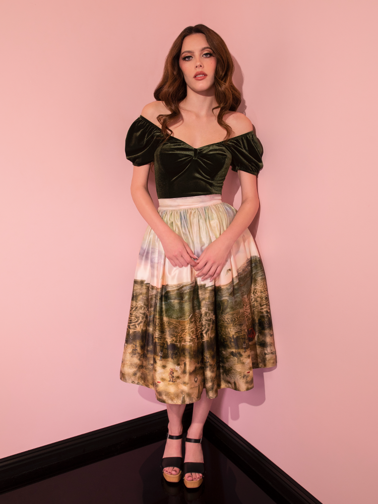 In a glamorous display, the captivating model models the LABYRINTH™ Renaissance Skirt in the Labyrinth Watercolor Print from Vixen Clothing's retro line.