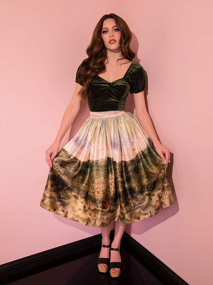 The LABYRINTH™ Renaissance Skirt, featuring the Labyrinth Watercolor Print, is a statement piece donned by this stunning model, redefining retro style.