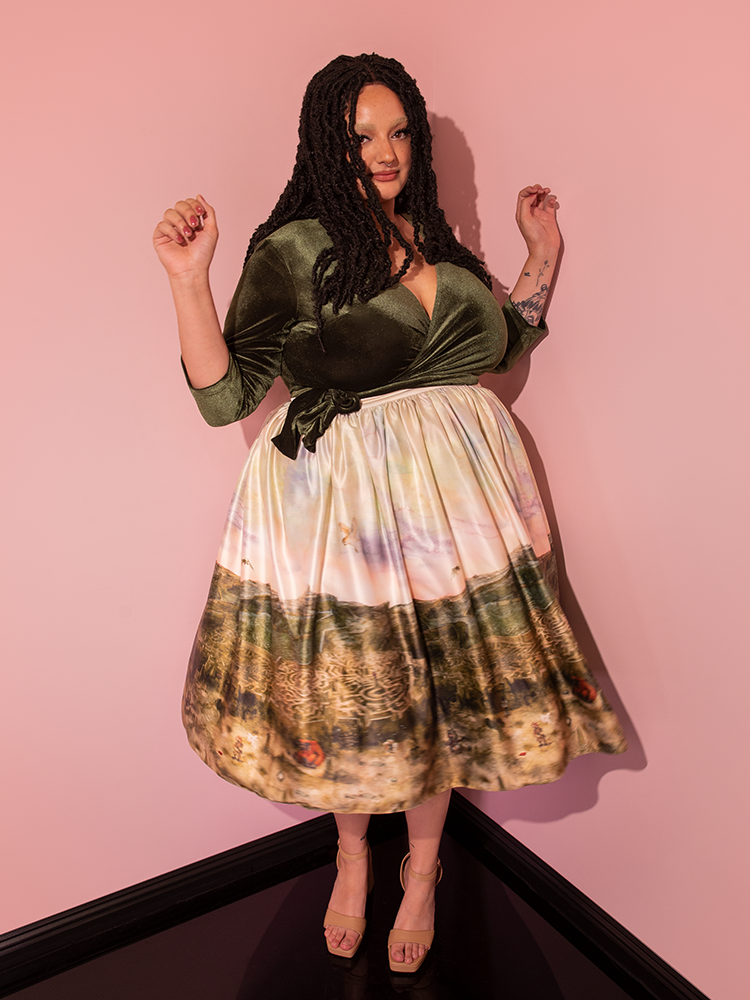 Vixen Clothing's LABYRINTH™ Renaissance Skirt and the coordinating Labyrinth Watercolor Print add a touch of vintage glamour to the look of this beautiful model.