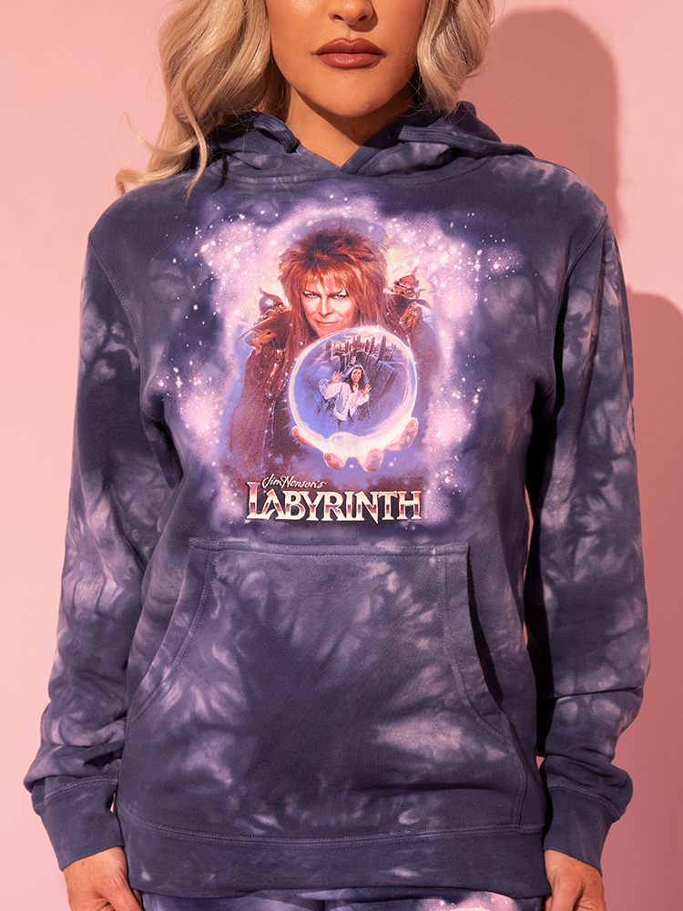 Envision perfection: our lovely model dons the Midnight Blue Tie Dye LABYRINTH™ Goblin King Hoodie, sourced from the iconic Vixen Clothing retro brand.