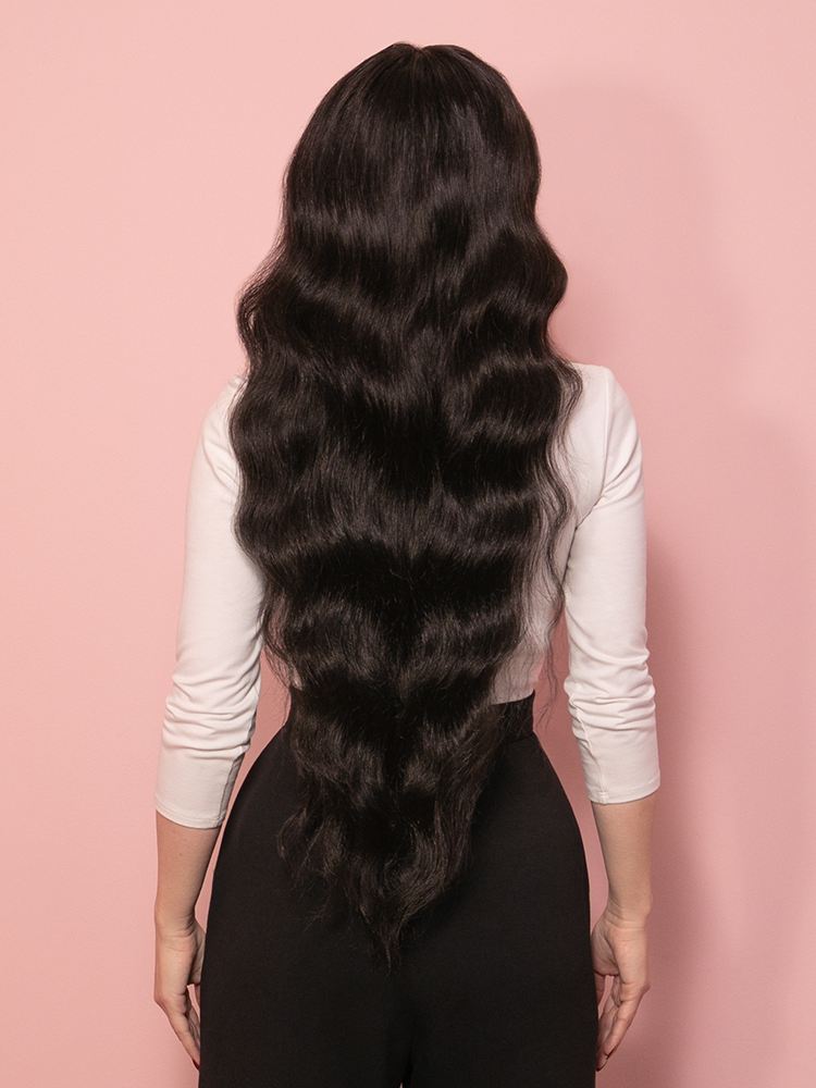 Rear view of the white Vixen Top, showcasing the seamless pull-on design and the clean, smooth lines of the double-lined bodice.