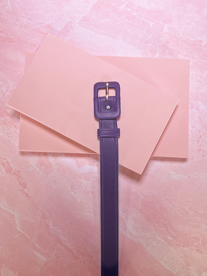 Product shot of the 1" Belt in Purple Faux Leather made by retro dress and clothing brand Vixen Clothing.