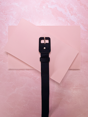 
Add understated elegance to your look with this 1" black crepe belt, designed to cinch your waist with vintage-inspired sophistication. Perfect for complementing a vintage style dress for a sleek, classic Hollywood finish.