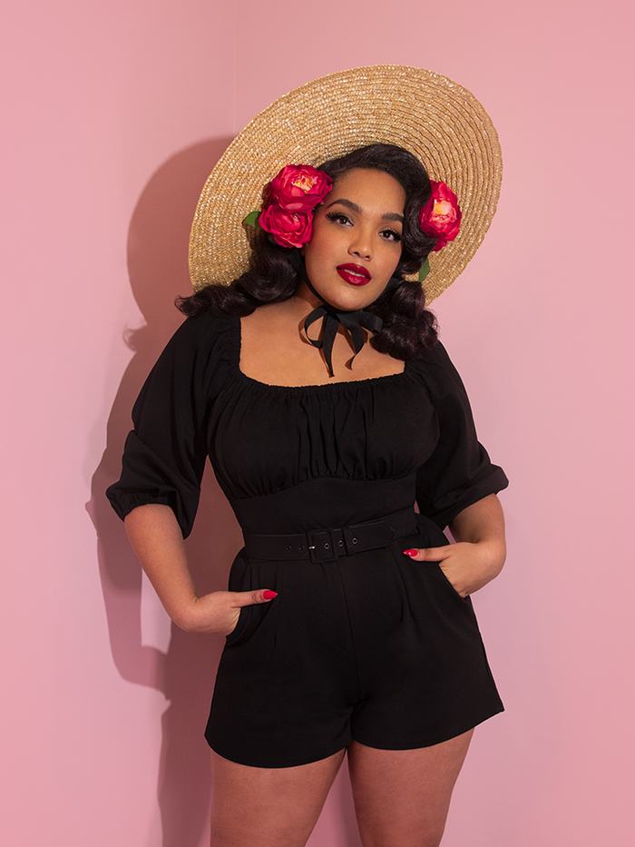 Ashleeta shows off the Vacation Playsuit in Black Ponte from Vixen Clothing.