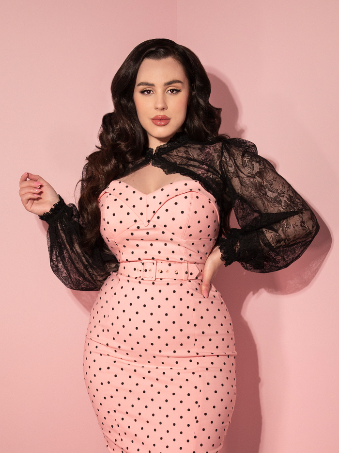 Rachel showing off the Vixen Vintage Lace Bolero in Black paired with her pink polka dot retro dress.