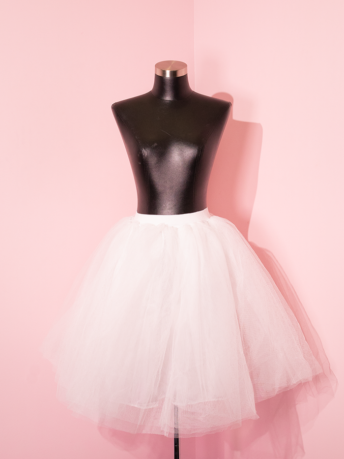 The Vintage Style Crinoline Under Skirt in White modeled on a mannequin torso.