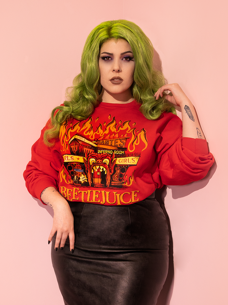 The BEETLEJUICE™ - Dante's Inferno Sweatshirt (Unisex) being worn with a vegan leather skirt by Vixen female model.