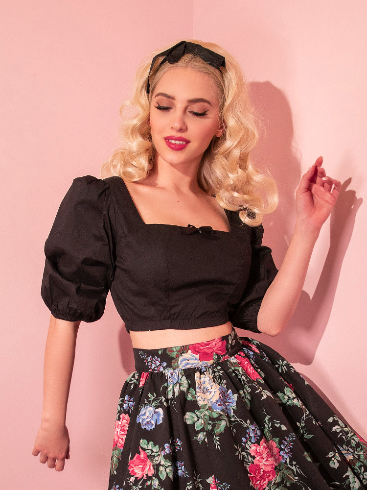 Sofia dances away in a gorgeous retro outfit including the Darling Crop Top in Black from Vixen Clothing.