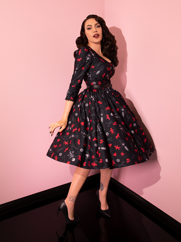 The EDWARD SCISSORHANDS Storytime Swing Dress in “I am not complete” Novelty Print from retro dress maker Vixen Clothing.