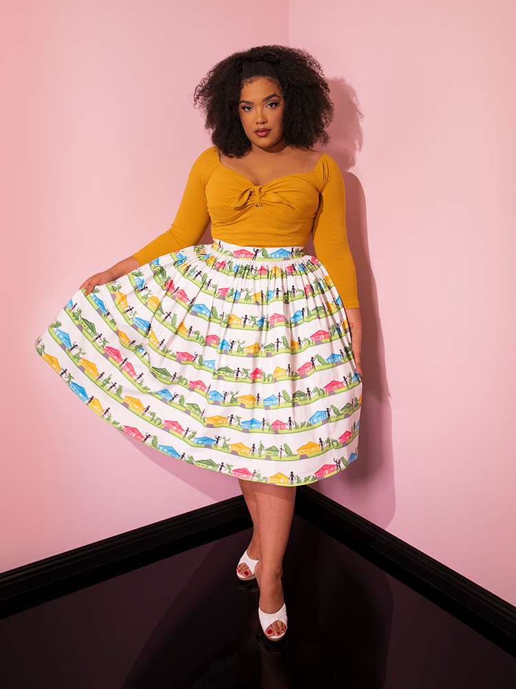 Ashleeta pulling out the skirt section on the EDWARD SCISSORHANDS Swing Skirt in Suburban Topiary Novelty Print