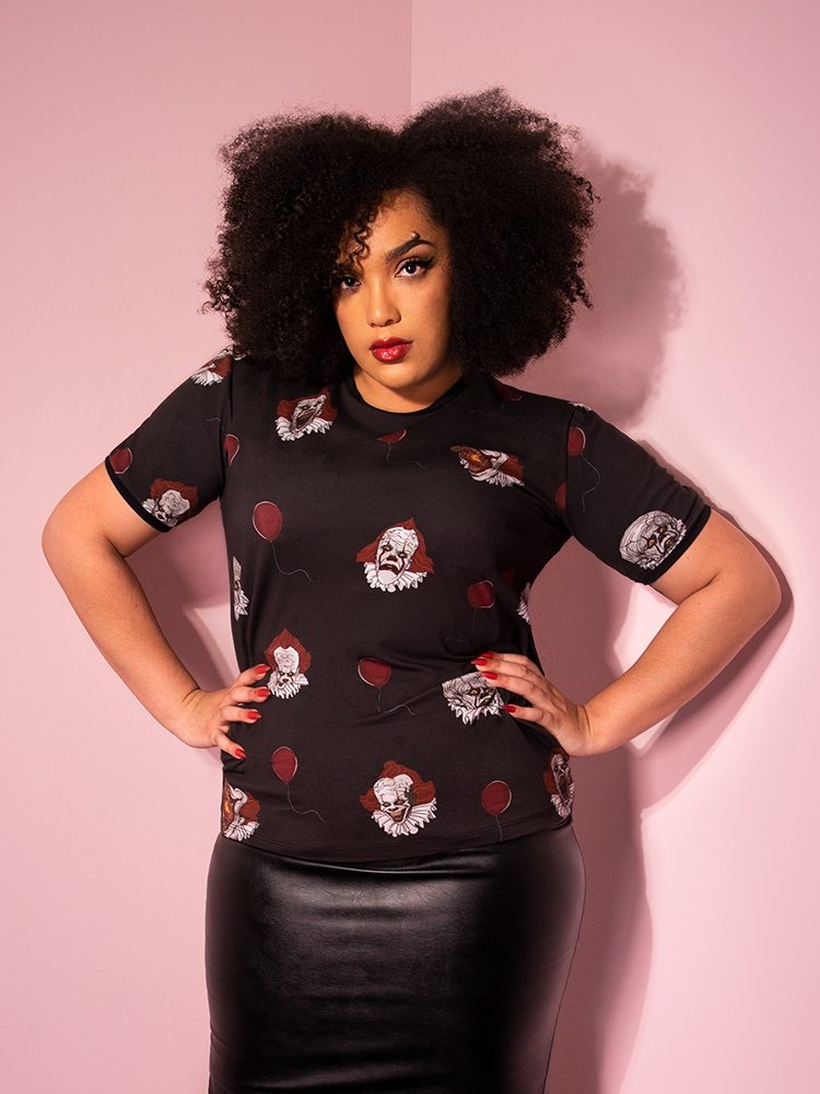 Ashleeta models the Pennywise ringer tee untucked by Vixen Clothing.