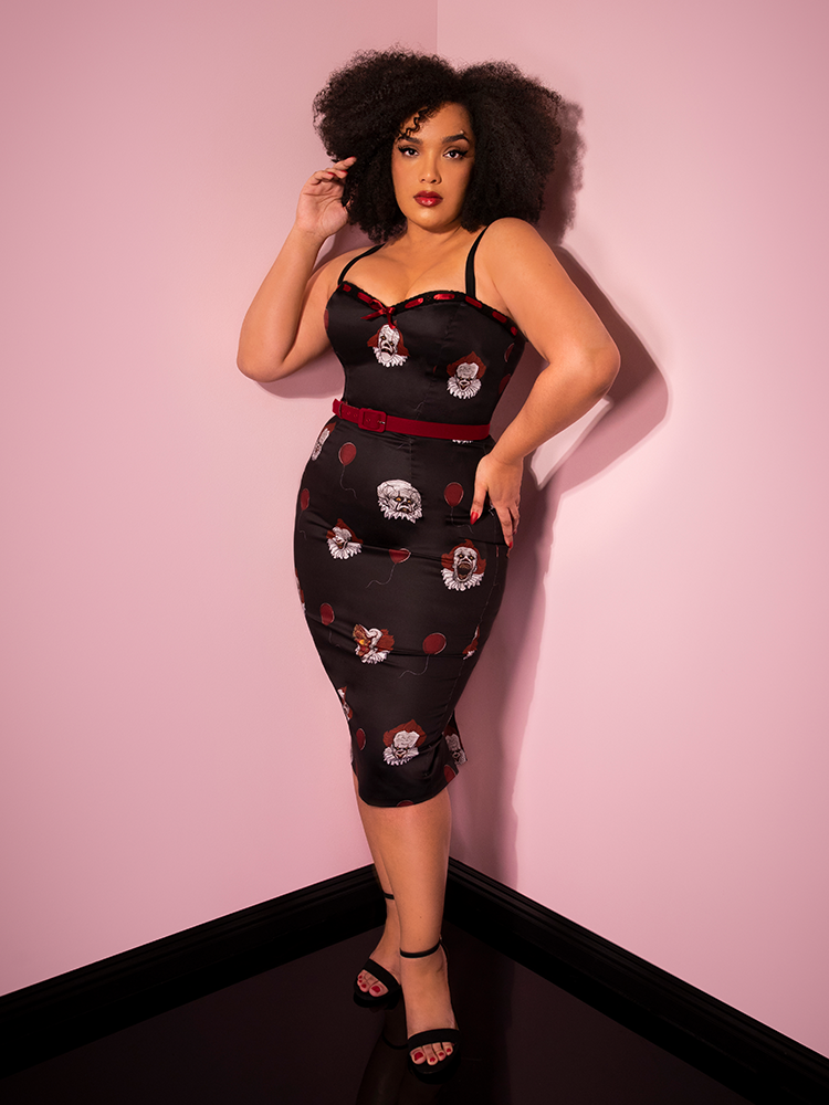 A full length photo of Ashleeta modeling the Pennywise sweetheart wiggle dress by Vixen Clothing.