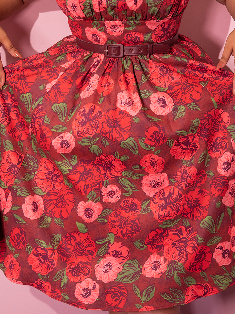 Close-up of the Ingenue Dress in Chocolate Rose Print from retro dress company Vixen Clothing.