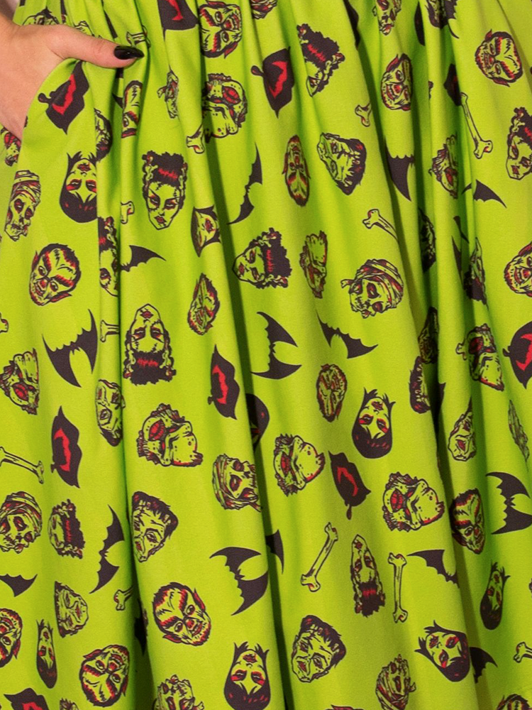 Close up shot of the print on the  Bad Girl 3/4 Sleeve Top in Vintage Monster Mash Print.