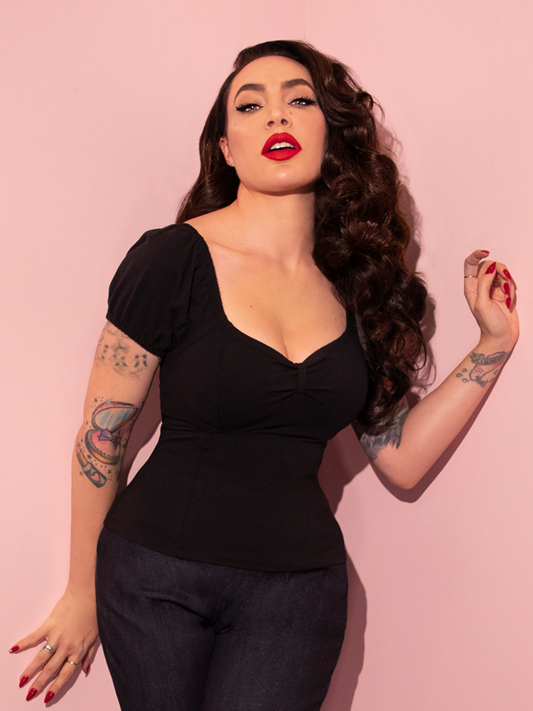 The Powder Puff Top in Black being worn by Vixen model and owner, Micheline Pitt.