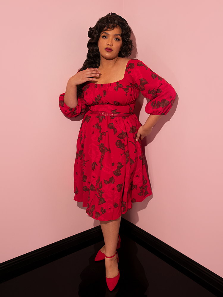 The Vacation Dress in Vintage Red Rose Print being modeled by Ashleeta from Vixen Clothing.