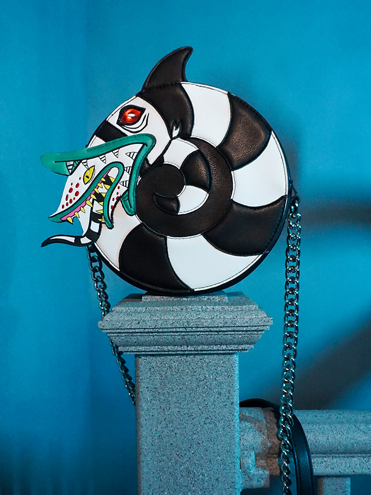 The BEETLEJUICE™ Sandworm Crossbody Bag from vintage clothing brand Vixen Clothing.