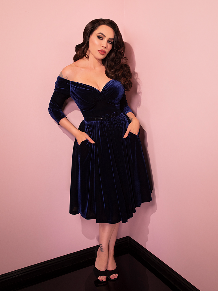 The Starlet Swing Dress in Navy Velvet - a luscious and shimmering dress from vintage dress brand Vixen Clothing.
