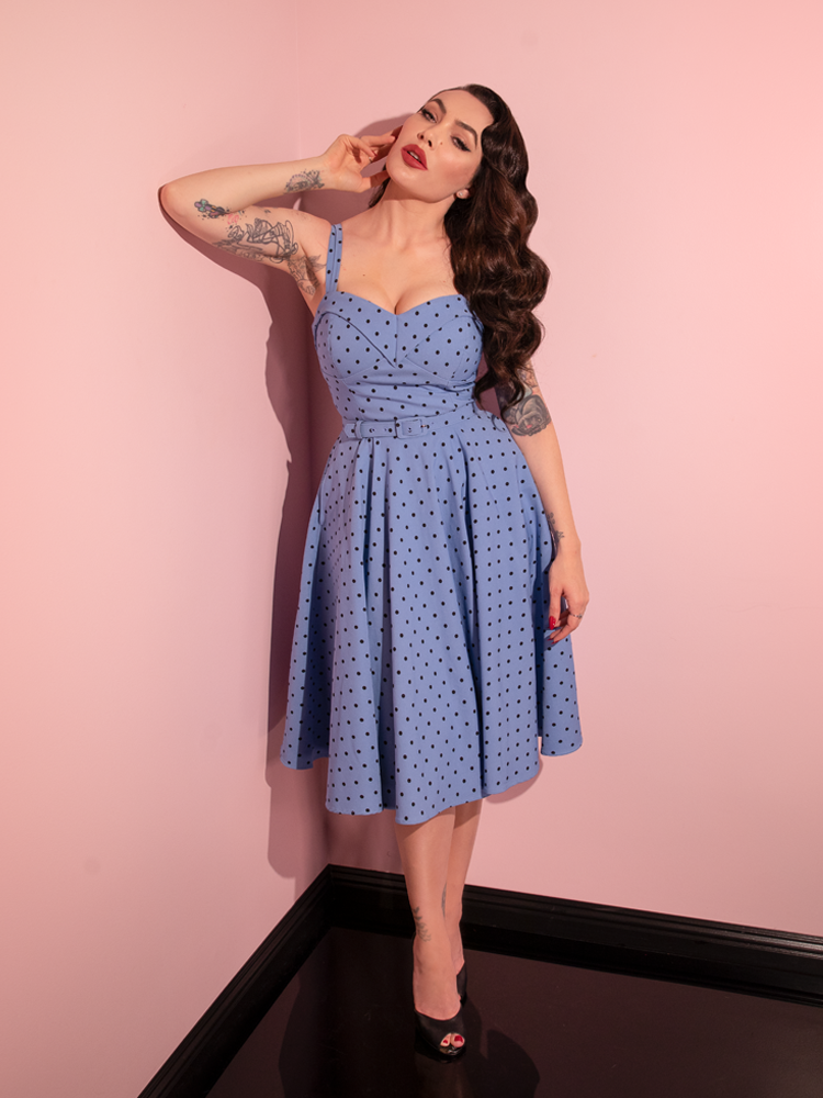 The Maneater Swing Dress in Sunset Blue Polka Dot from retro style dress maker Vixen Clothing.