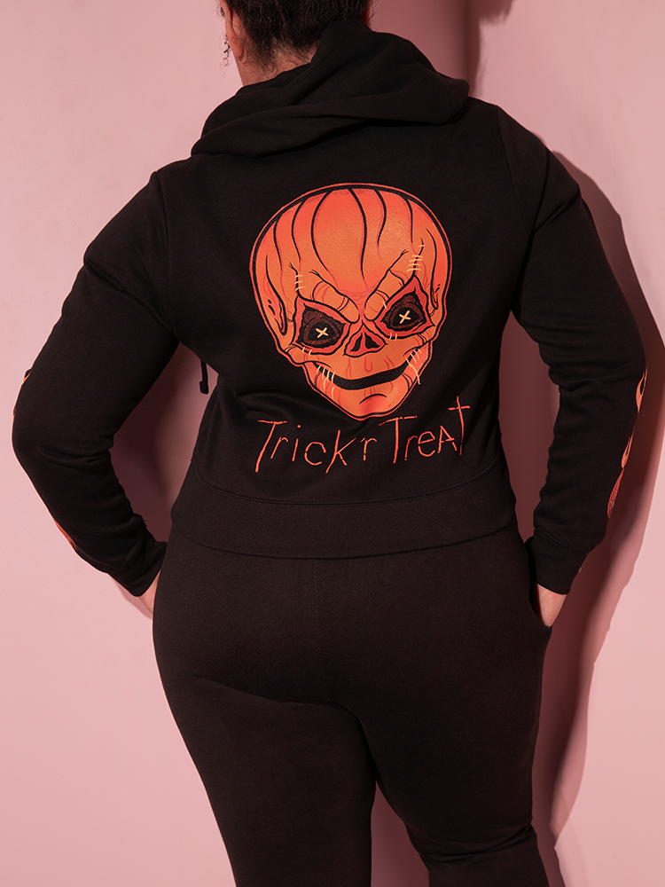 Close-up of the print on the back of the TRICK R TREAT™ Sam Cropped Hoodie being worn by female model.