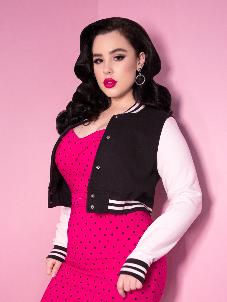 Rachel Sedory wearing the Vixen Girl Gang Letterman Jacket along with a sexy hot pink jacket with black polka dots.