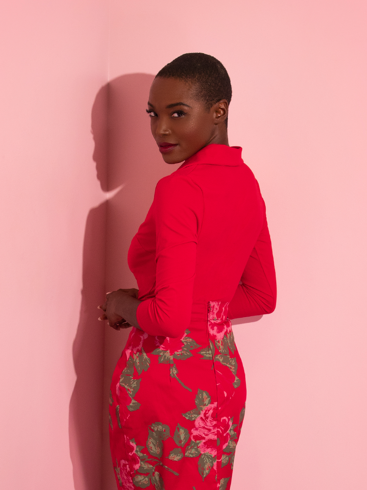 Model turned away from the camera to show off the back of the Vixen Top in Ravishing Red.