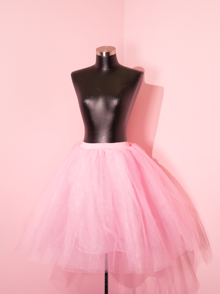 Vintage Style Crinoline Under Skirt in Pink modeled on a mannequin torso.