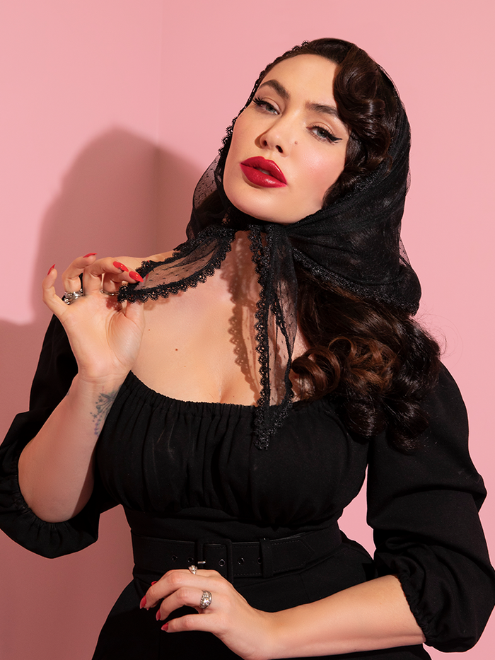 Micheline Pitt modeling the Vintage Style Black Lace Scarf from Vixen Clothing.
